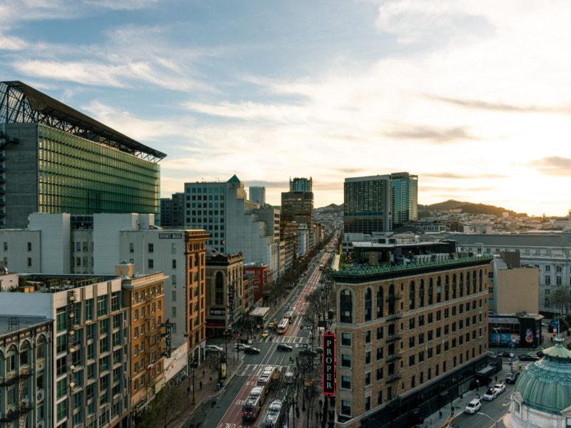 Western sunset view of San Francisco from 50 Jones Apartments rooftop