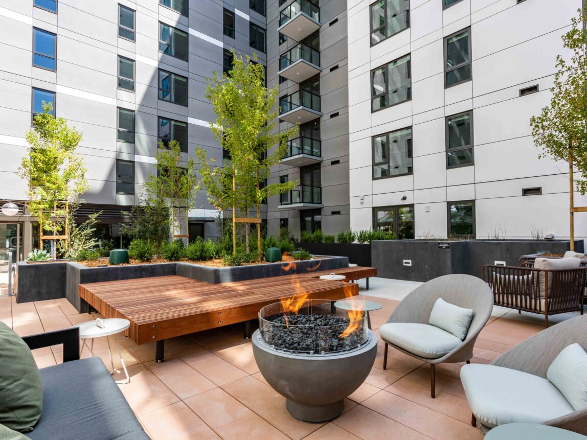 Luxury Apartments Near Union Square - 50 Jones - Landscaped Courtyard with Fire Pit, Social Seating, and Relaxing Spaces.